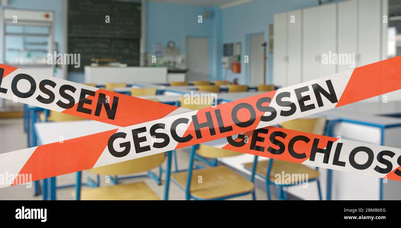 School closed. Barrier tapes with the German word `GESCHLOSSEN` CLOSED Stock Photo Alamy